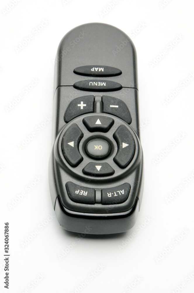 Remote control for digital TV tuners, music players, navigator and disk drives on a white background Remote control for digital TV tuners, music players, navigator and disk drives on a white background