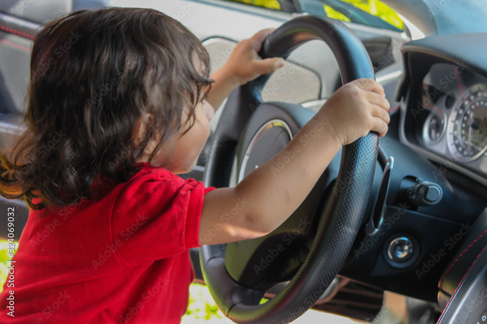 baby boy two hands wheel luxury car driving doors up vision focus money bitcoin baby boy two hands wheel luxury car driving doors up vision focus money bitcoin