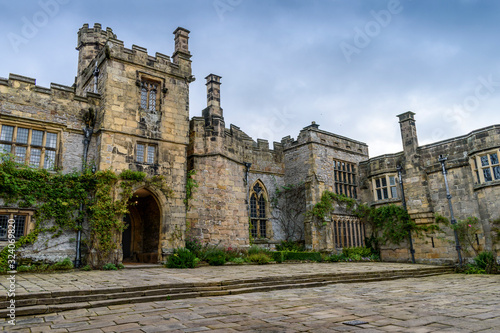 Exterior view of a Tudor fortified house, with a central entrance tower.,Haddon Hall, Bakewell photo