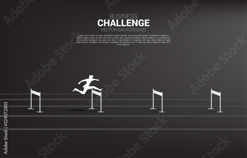 Silhouette businessman jumping across hurdles obstacle. Background concept for Obstacle and challenge in business