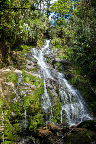 Lots of Vegetation, Plants, Moss on the Rocks at Las Golondrinas Waterfalls in Antioquia, Colombia © Alexandre