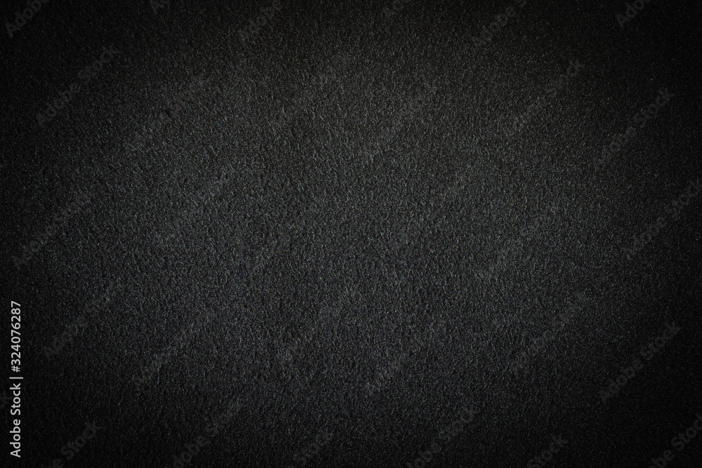 Black fabric, luxury dark gray background abstract. Material are used in textile assembly. Detail cloth texture of pattern. Design, elegance with vignette effect, free copy space for text placement. Black fabric, luxury dark gray background abstract. Material are used in textile assembly. Detail cloth texture of pattern. Design, elegance with vignette effect, free copy space for text placement.