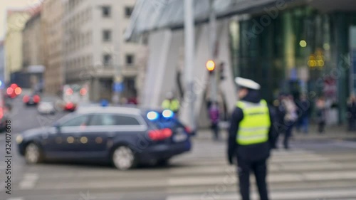 Wallpaper Mural Blurred policemen controlling traffic on road Torontodigital.ca