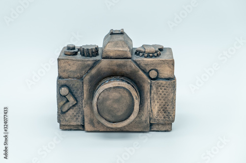  ceramic camera sculpture on white background
