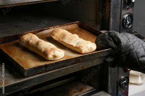 Freshly baked homemade rolled bread buns