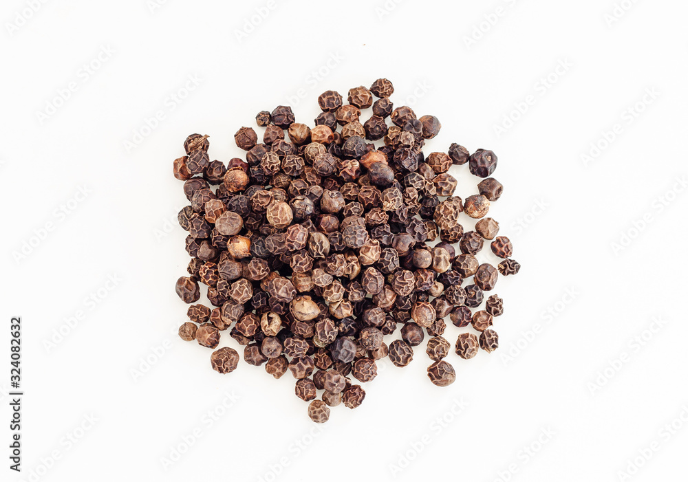 Small pile of black pepper isolated on white background. Small pile of black pepper isolated on white background.