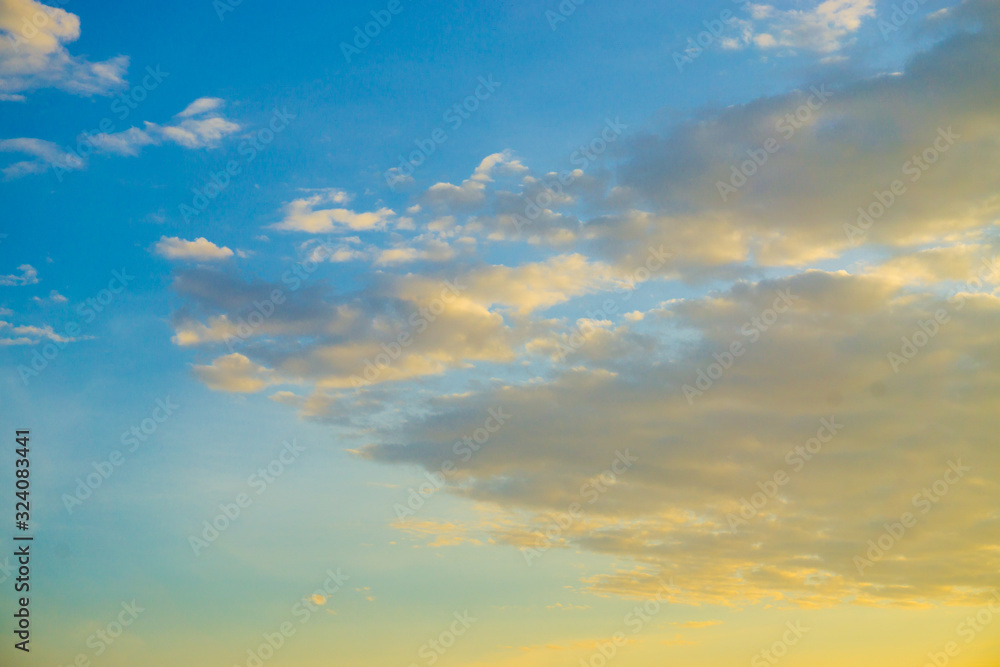 Mostly white cloud against blue sky nature background evening scene