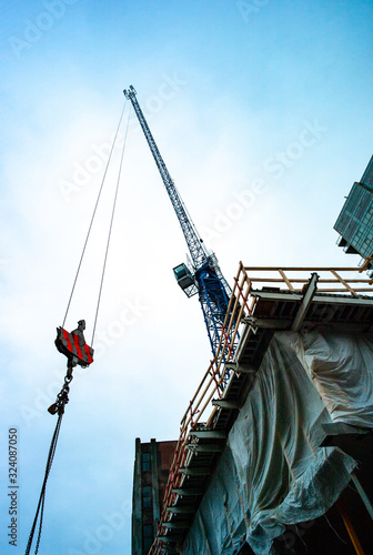 Crane with Pulley of a Building Under Construction in Montreal, Quebec / Canada