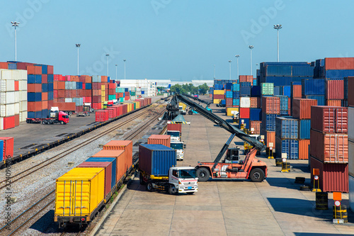 crane lifting container box to container truck a logistics transports in shipyard, a supply chain technology and logistics concept  
