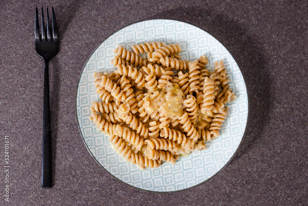 plant-based recipes, wholemeal fusilli pasta with mustard garlic sauce plant-based recipes, wholemeal fusilli pasta with mustard garlic sauce