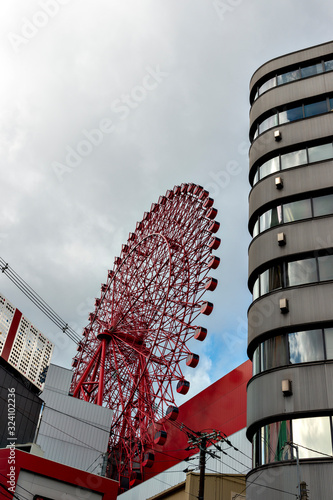  Ferris wheel among office buildings in the core of Osaka city photo