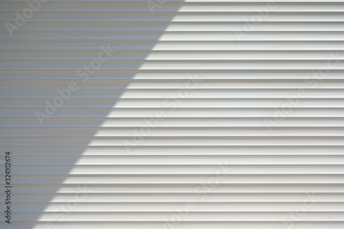 white roller shutter door closed security in modern house