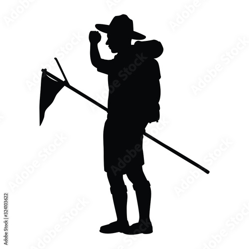 Boy scout with his equipment silhouette vector