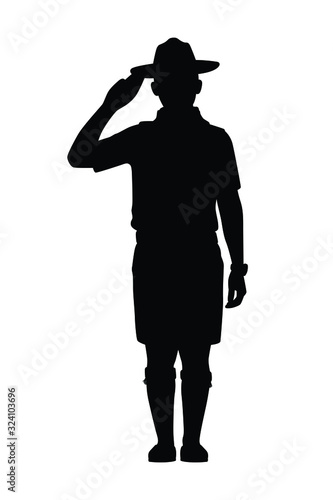 Boy scout with his equipment silhouette vector photo