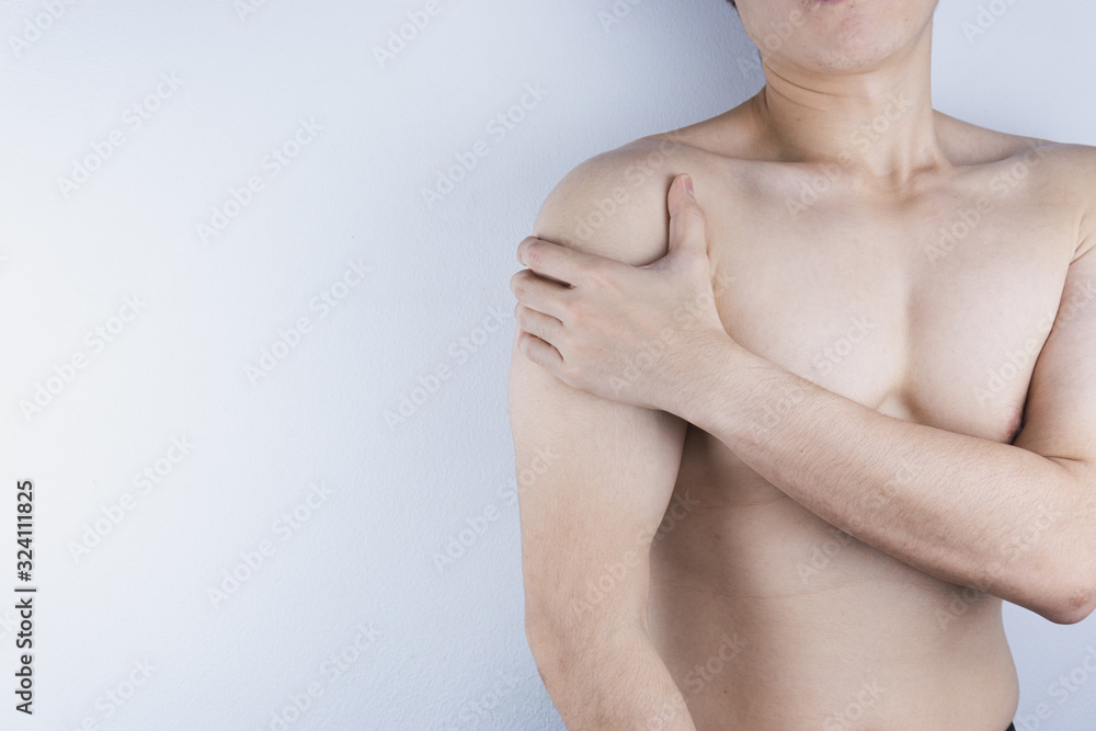 Closeup man suffering from shoulder pain. Health care and medical concept. Closeup man suffering from shoulder pain. Health care and medical concept.