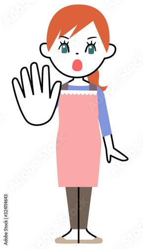 エプロンを着て片手を出して制止する若い女性