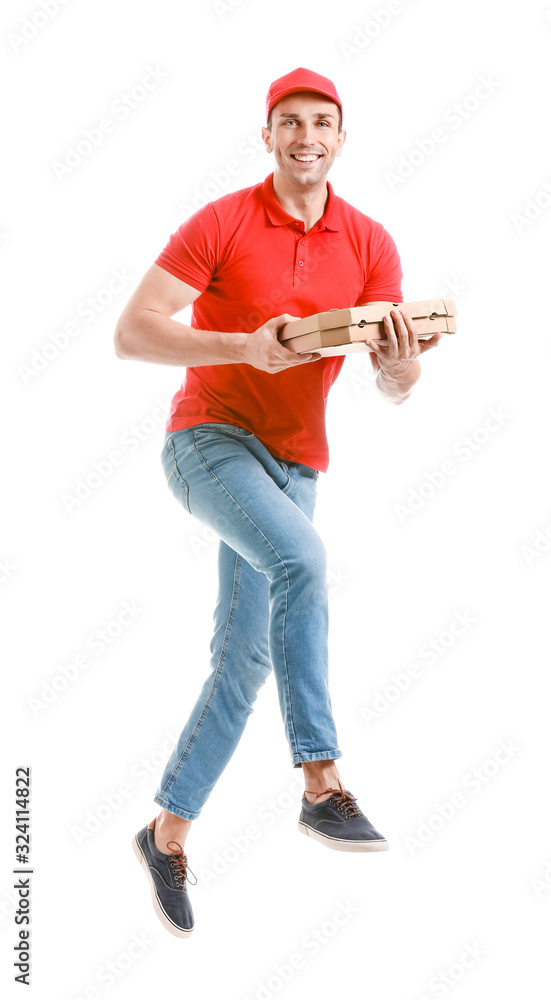 Jumping delivery man with pizza on white background Jumping delivery man with pizza on white background