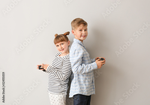 Little children playing vid...