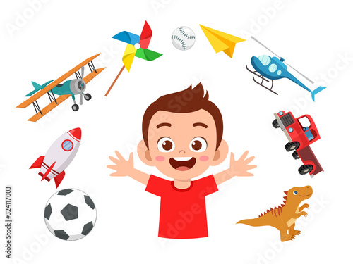 happy cute little kid boy play with toys