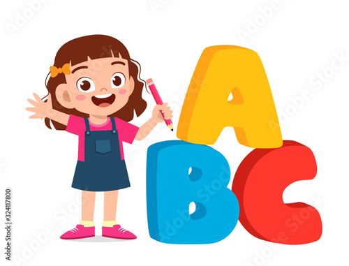 happy cute little kid boy with alphabet