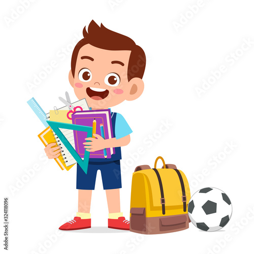 happy cute little kid boy prepare for school