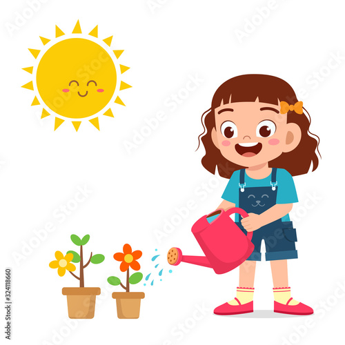 happy cute little kid girl watering flower