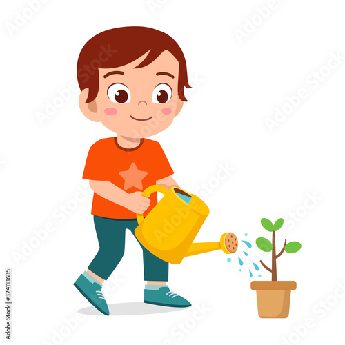 happy cute little kid boy watering flower