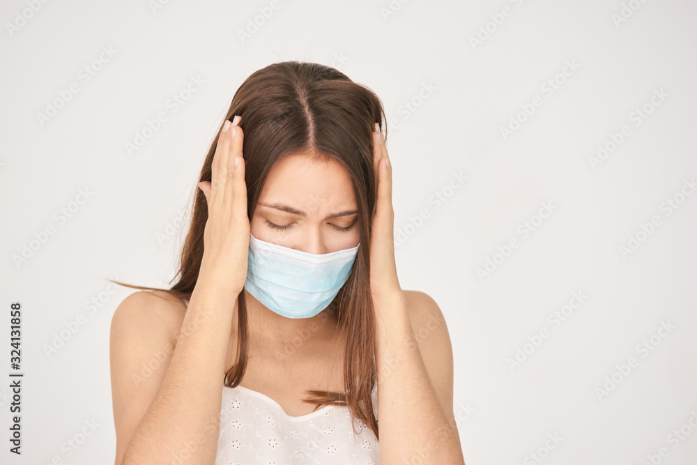 Sick beauty white girl with protective mask. Pandemic quarantine corona virus. Illness influenza patient. Anti flu treatment. Sick beauty white girl with protective mask. Pandemic quarantine corona virus. Illness influenza patient. Anti flu treatment.