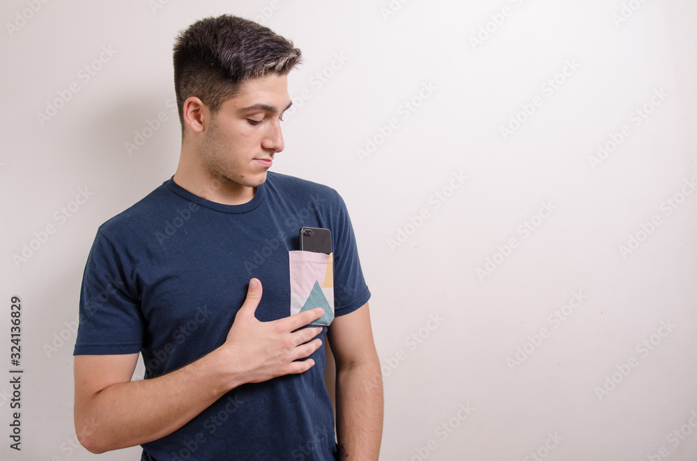 Young man with his cell phone Young man with his cell phone