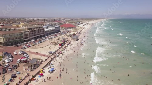 Aerial view of a busy beach in Cape Town, South Africa, Muizenberg Beach photo