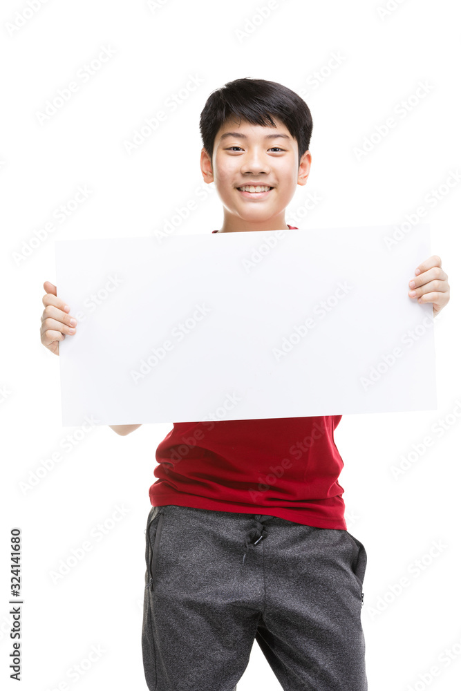 Boy holds blank sign. Teen boy holds empty billboard. Boy holds blank sign. Teen boy holds empty billboard.