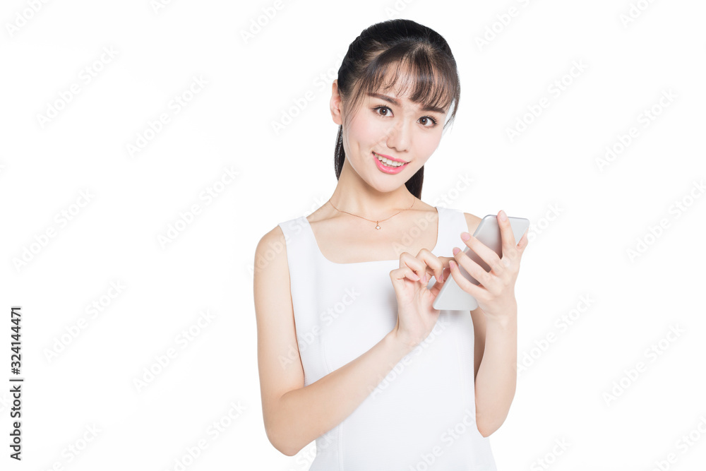 young woman wearing white dress using smartphone against white background young woman wearing white dress using smartphone against white background
