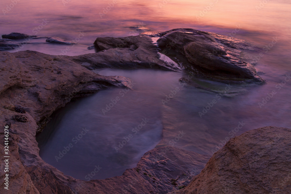 Obraz premium Mystery colourful sea with rocks befor sunrise near Ravda sity, bulgaria Black sea coast. 