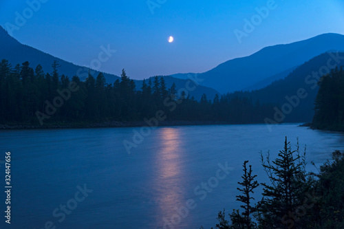 Tableau sur toile Moonlit night on the river.