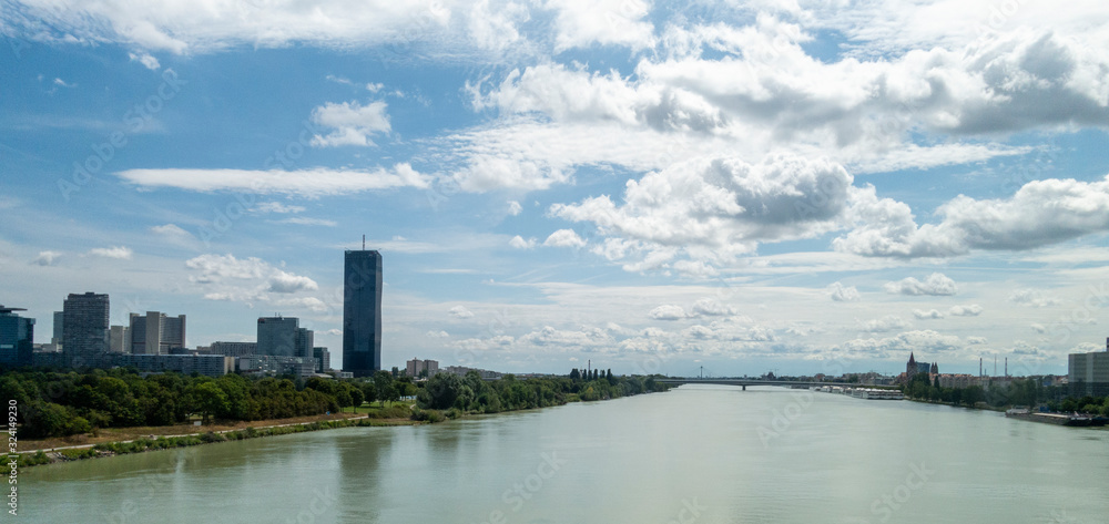 Beautiful view of Danube river from bridge in Vienna, Austria, summer day