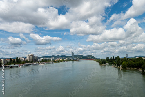 Beautiful view of Danube river from bridge in Vienna, Austria, summer day © Oana