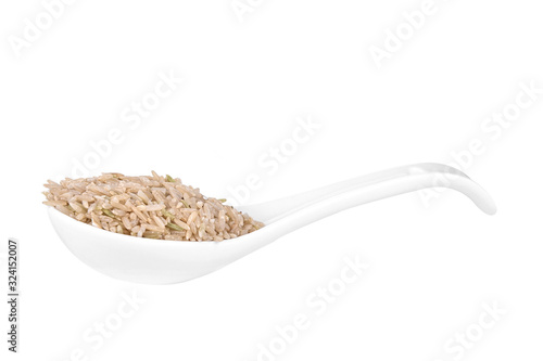 Coarse rice in spoon a white background