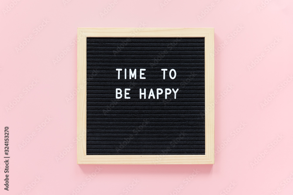 Fototapeta Time to be happy. Motivational quote on letterboard on pink background. Top view Flat lay Concept inspirational quote of the day