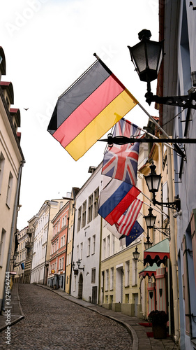 Waving flags of Germany, Britain and Russia