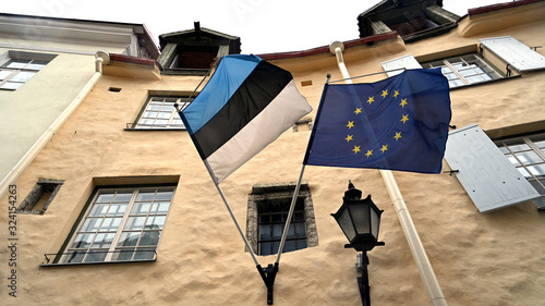 Waving flag of Estonia and European Union