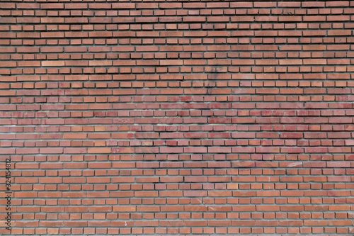 red rough brick wall abstract background