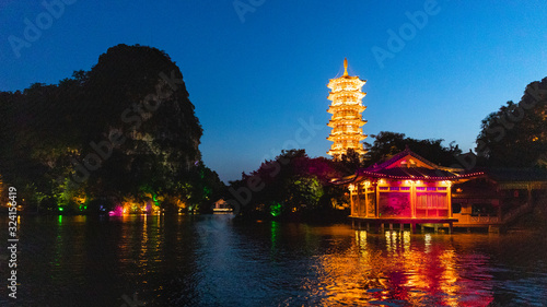 Beautiful landscape and view of a Pagoda during a boat cruise in Guilin, China