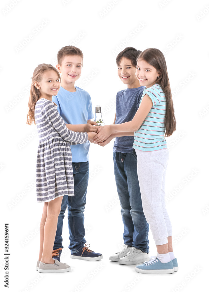 Little children holding light bulb with plant on white background. Earth Day celebration Little children holding light bulb with plant on white background. Earth Day celebration