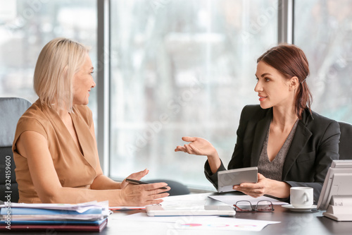 Female accountant and her c...