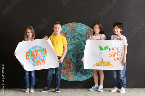 Little children with poster...