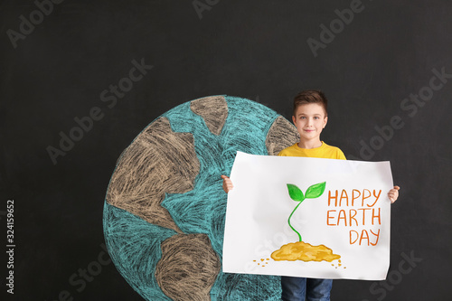 Little boy with poster and ...