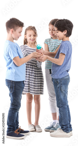 Little children holding lig...