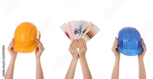 Many hands with architect's...