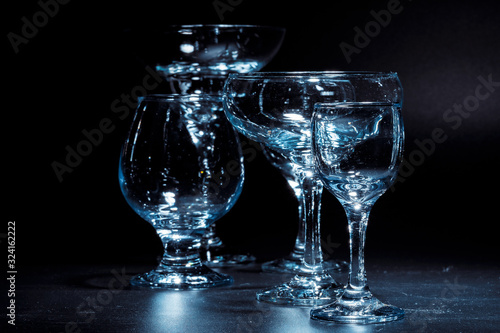 Empty glasses for drinks on dark background
