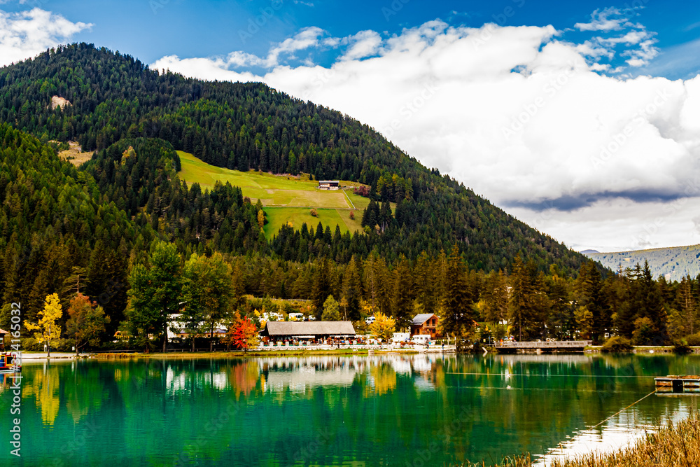 Lake Toblacher (Lago di Dobbiaco) in Dolomites Mountains, Sudtirol, Italy. Lake Toblacher (Lago di Dobbiaco) in Dolomites Mountains, Sudtirol, Italy.